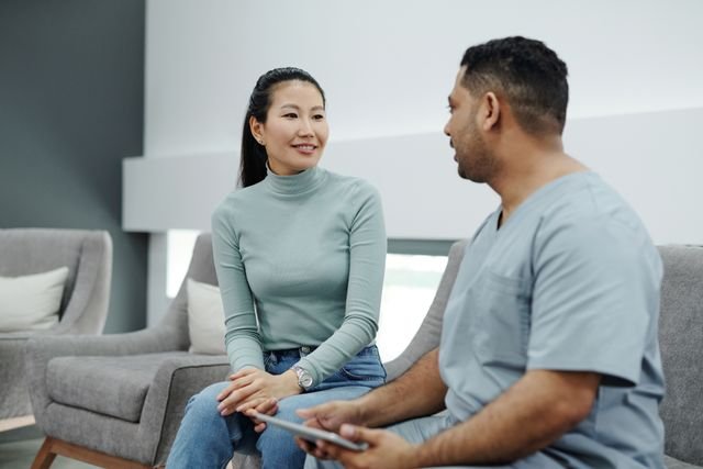 Doctor and patient discussing health information during a consultation