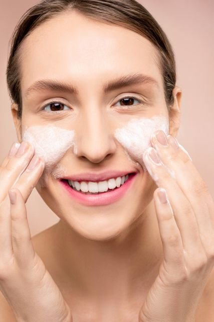 OSEA Malibu Review: Are Its Skincare Products Worth the Price? 5 Woman washing her face with foamy cleanser