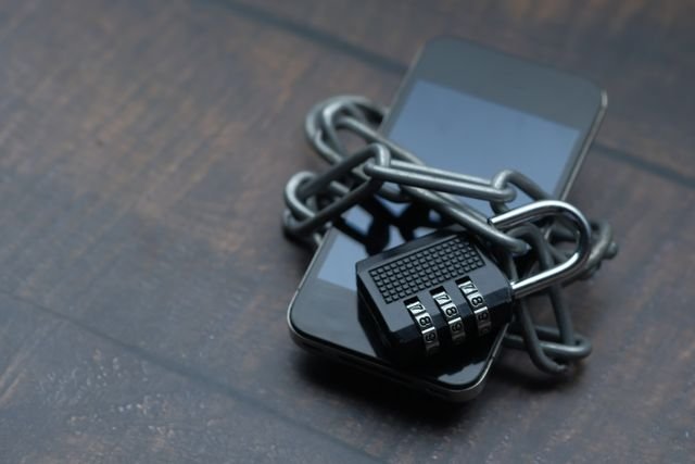 Smartphone secured with a chain and combination lock